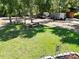 Spacious grassy backyard with picnic table at 1147 Davis Ln, Englewood, FL 34224