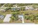 An aerial view of the property, with a yellow border delineating the property's boundaries at 1205 Bartlett Ave, North Port, FL 34288