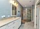 Modern bathroom featuring a spacious glass-door shower and updated vanity, creating a luxurious and relaxing atmosphere at 1205 Bartlett Ave, North Port, FL 34288