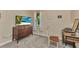 Bedroom featuring a window, dresser, desk and carpeted floors at 1205 Bartlett Ave, North Port, FL 34288