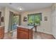 Kitchen featuring an island, granite countertops, stainless appliances, and lots of natural lighting at 1205 Bartlett Ave, North Port, FL 34288