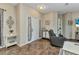 Inviting living room featuring tile flooring, neutral colors, and comfortable seating, creating a cozy atmosphere at 1205 Bartlett Ave, North Port, FL 34288