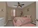 Charming bedroom featuring neutral walls, decorative accents, and carpet at 18043 Avonsdale Cir, Port Charlotte, FL 33948