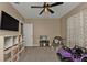 ' bedroom with toys, a ceiling fan, and good natural light from window at 18043 Avonsdale Cir, Port Charlotte, FL 33948