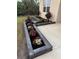 Charming front yard features a flower bed with multi-colored flowers and lush plants at 18043 Avonsdale Cir, Port Charlotte, FL 33948