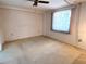 Spacious bedroom with neutral carpeting and a window with blinds at 21062 Edgewater Dr, Port Charlotte, FL 33952