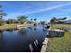 Scenic view of the canal with neighboring properties at 21062 Edgewater Dr, Port Charlotte, FL 33952
