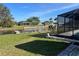 Lovely backyard with canal views and lush grass at 21062 Edgewater Dr, Port Charlotte, FL 33952