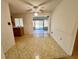 Dining room with patterned flooring and access to the kitchen and sunroom at 21062 Edgewater Dr, Port Charlotte, FL 33952