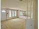 Bright living room featuring a large mirror and ample natural light at 21062 Edgewater Dr, Port Charlotte, FL 33952