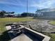 Mosaic patio table with a view of the canal at 21062 Edgewater Dr, Port Charlotte, FL 33952