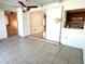 Sunroom with views into adjacent rooms and kitchen at 21062 Edgewater Dr, Port Charlotte, FL 33952