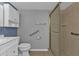 Bathroom with shower, grab bars, and tiled flooring at 21320 Brinson Ave # 117, Port Charlotte, FL 33952