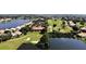 Aerial view of a golf course and community clubhouse at 26247 Stillwater Cir, Punta Gorda, FL 33955