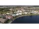 Aerial view of lakefront homes in a residential community at 26247 Stillwater Cir, Punta Gorda, FL 33955