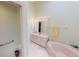Main bathroom with tub, shower and double vanity at 26247 Stillwater Cir, Punta Gorda, FL 33955