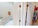 Bathroom with a large soaking tub and walk-in closet at 26247 Stillwater Cir, Punta Gorda, FL 33955