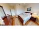Guest bedroom with queen bed and access to a bathroom at 26247 Stillwater Cir, Punta Gorda, FL 33955