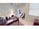 Home office features a desk, chair, and ample natural light at 26247 Stillwater Cir, Punta Gorda, FL 33955