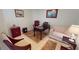 Bright office with built-in desk and comfortable seating area at 26247 Stillwater Cir, Punta Gorda, FL 33955