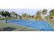 Well-maintained tennis court in a sunny location at 26247 Stillwater Cir, Punta Gorda, FL 33955