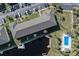 Aerial view of building, pool, and waterway at 4000 Bal Harbor Blvd # 126, Punta Gorda, FL 33950