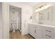 Updated bathroom with white vanity, quartz countertop, and walk-in shower at 4000 Bal Harbor Blvd # 126, Punta Gorda, FL 33950