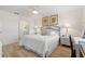 Bright bedroom with a queen-size bed and en-suite bathroom at 4000 Bal Harbor Blvd # 126, Punta Gorda, FL 33950