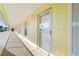 Condo building hallway with exterior view at 4000 Bal Harbor Blvd # 126, Punta Gorda, FL 33950