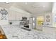 Updated kitchen with granite countertops and stainless steel appliances at 4000 Bal Harbor Blvd # 126, Punta Gorda, FL 33950