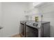 Laundry room with washer and dryer and shelving at 4000 Bal Harbor Blvd # 126, Punta Gorda, FL 33950