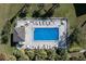 Community pool with surrounding patio furniture at 4000 Bal Harbor Blvd # 126, Punta Gorda, FL 33950