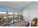 Bright sunroom with water views and comfortable seating at 4000 Bal Harbor Blvd # 126, Punta Gorda, FL 33950