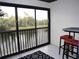 Balcony with water view, black and white rug, and small table with barstools at 4048 Oakview Dr # F2-3, Punta Gorda, FL 33980