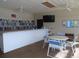 Community room with seating and a bar at 4048 Oakview Dr # F2-3, Punta Gorda, FL 33980