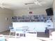 Community room features a library, TV, and seating at 4048 Oakview Dr # F2-3, Punta Gorda, FL 33980