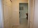Hallway with view into living area at 4048 Oakview Dr # F2-3, Punta Gorda, FL 33980