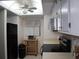 Kitchen with black appliances and wood shelving at 4048 Oakview Dr # F2-3, Punta Gorda, FL 33980