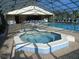Octagonal spa adjacent to the community pool at 4048 Oakview Dr # F2-3, Punta Gorda, FL 33980