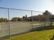 Tennis court with chain link fence at 4048 Oakview Dr # F2-3, Punta Gorda, FL 33980