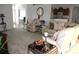 Large living room with a sectional sofa, recliner, and various decorative accents at 4692 Hillman Ter, North Port, FL 34288