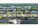 Waterfront community with single-Gathering homes, private docks, and lush foliage at 5541 Almar Dr, Punta Gorda, FL 33950