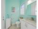 Charming bathroom with a flamingo theme and a single vanity at 5541 Almar Dr, Punta Gorda, FL 33950