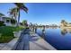 Concrete dock extends to the canal, offering scenic waterfront views at 5541 Almar Dr, Punta Gorda, FL 33950