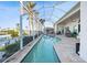 Long, inviting, screened pool with canal views at 5541 Almar Dr, Punta Gorda, FL 33950