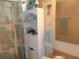 Bathroom with shower/tub combo, vanity, and linen cabinet at 6546 Greenview Ct, North Port, FL 34287