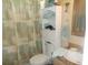 Bathroom with shower/tub combo, vanity, and linen cabinet at 6546 Greenview Ct, North Port, FL 34287