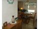 Kitchen and dining area with wood table and chairs at 6546 Greenview Ct, North Port, FL 34287