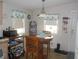 Small dining area in the kitchen with round table and chairs at 6546 Greenview Ct, North Port, FL 34287