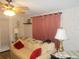 Spacious living room with striped sofa and two lamps at 6546 Greenview Ct, North Port, FL 34287